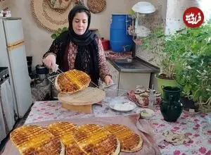 ببینید| غذای روستایی در ایران؛ پخت نان محلی به روش سنتی در هوای برفی روستا