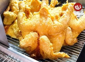 ببینید؛ غذای خیابانی در کره؛ تهیه مرغ کامل سوخاری با هیزم بلوط در سئول