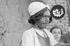 عکس| سفر زمان؛ معرکه‌گیری درویش مارگیر؛ یک قرن قبل