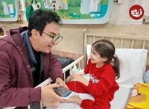 تصاویر| دیدار عموپورنگ با کودکان بیمار و مجروح در جنگ