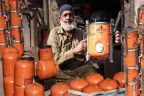 (ویدئو) فرآیند ساخت «بخاری هیزمی» با کمپرسور قدیمی یخچال
