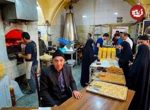 ببینید| غذای خیابانی در ایران؛ فرآیند دیدنی تولید حلوا ارده با کنجد در قم