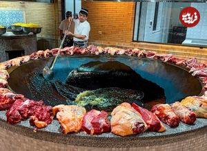 ببینید؛ غذای خیابانی در ازبکستان؛ پخت 500 کیلو سمرقند پلو با گوشت برای مراسم عروسی در تاشکند