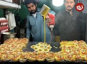 ببینید| غذای خیابانی در پاکستان؛ پخت دوبل برگر با تخم مرغ در کراچی 
