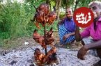 (ویدئو) روش خلاقانه پدر و پسر روستایی هندی برای کباب کردن 10 مرغ