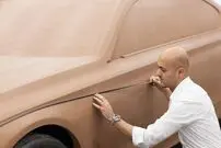 (ویدئو) ساخت دیدنی خودروی لوکس و شاسی بلند BMW با شن!