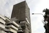(عکس) تهران قدیم؛ «کارگران در حال احداث اسکلت ساختمان پلاسکو»؛ سال 39
