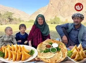 ببینید| غذای روستایی در افغانستان؛ پخت بولانی توسط زوج افغان در کوهستان