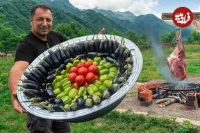 ببینید| غذای روستایی در آذربایجان؛ تهیه دلمه با بادمجان، گوجه و فلفل دلمه ای