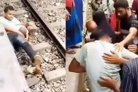 ببینید| معجزه در ایستگاه قطار؛ پدری با فداکاری خود را سپر فرزندش کرد