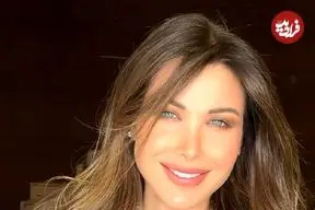 عکس| سفر در زمان؛ «نانسی عجرم» در حال اجرا در یک مهمانی خیریه در قاهره؛ سال 1384