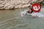ببینید| شیرجه زن بختیاری در آب برای شست‌وشوی گوسفندان
