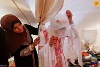 (ویدئو) جشن عروسی زوج جنگ‌زده در چادر