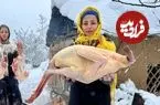 ببینید| غذای روستایی در ایران؛ پخت غذاهای سنتی با بوقلمون و مرغ در هوای برفی