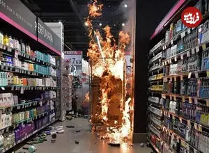 ببینید| آتش‌زدن فروشگاه توسط دو فرد نقاب‌دار