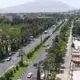 عکس| سفر زمان؛ اسب و الاغ و اتومبیل در یکی از خیابان‌های شیراز در سال 1328