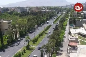 عکس| سفر زمان؛ اسب و الاغ و اتومبیل در یکی از خیابان‌های شیراز در سال 1328