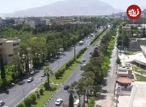 عکس| سفر زمان؛ اسب و الاغ و اتومبیل در یکی از خیابان‌های شیراز در سال 1328
