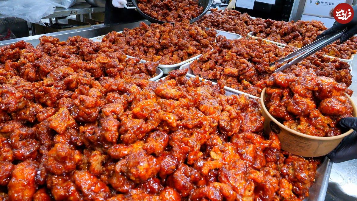 ببینید؛ غذای خیابانی در کره؛ پخت صدها کیلو مرغ سوخاری محبوب در سئول