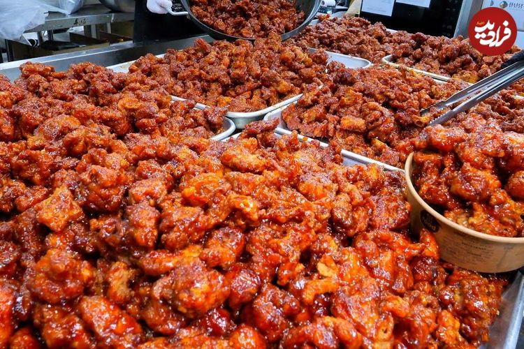 ببینید؛ غذای خیابانی در کره؛ پخت صدها کیلو مرغ سوخاری محبوب در سئول