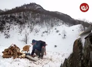 ببینید| غذای  روستایی در آذربایجان؛ پخت استیک روی سنگ داغ در کوهستانی برفی