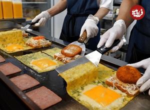 ببینید| غذای خیابانی در کره؛ تهیه ساندویچ با ژامبون، تخم مرغ و پنیر در سئول