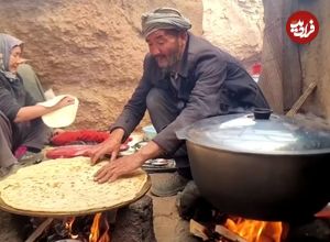 ببینید؛ غذای روستایی در افغانستان؛ پخت خوراک سیب زمینی و نان سنتی توسط زوج مسن