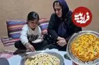 ببینید| غذای روستایی در ایران؛ پخت پیتزا خانگی توسط زوج روستایی روی آتش