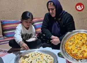 ببینید| غذای روستایی در ایران؛ پخت پیتزا خانگی توسط زوج روستایی روی آتش