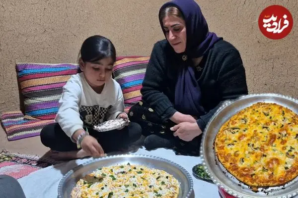 ببینید| غذای روستایی در ایران؛ پخت پیتزا خانگی توسط زوج روستایی روی آتش
