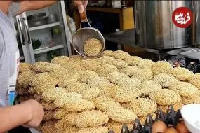 ببینید| غذای خیابانی در تایلند؛ نودل با میگو، سبزیجات و برنج سرخ شده در بانکوک