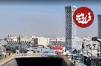 (عکس) تهران قدیم؛ «مرد جوان با پسر و دوچرخه اش در میدان امام حسین»؛ سال 38