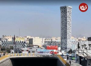 (عکس) تهران قدیم؛ «مرد جوان با پسر و دوچرخه اش در میدان امام حسین»؛ سال 38