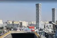 (عکس) تهران قدیم؛ «مرد جوان با پسر و دوچرخه اش در میدان امام حسین»؛ سال 38