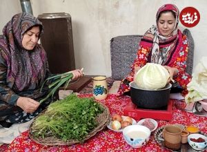 ببینید| غذای روستایی در ایران؛ پخت دلمه کلم در روستایی کوهستانی