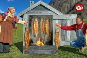 ببینید| غذای روستایی در آذربایجان؛ صید ماهی و دودی کردن آن در روستایی زیبا