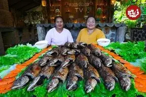 ببینید| غذای روستایی در سنگاپور؛ کباب ماهی با سیخ چوبی روی آتش در طبیعت