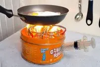 (ویدئو) چگونه قوطی فلزی مواد غذایی را به چراغ خوراک پزی تبدیل کنیم؟