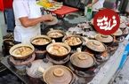 ببینید؛ غذای خیابانی در مالزی؛ پخت پلو مرغ محلی در دیگ سفالی در کوالالامپور