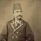 عکس| سفر زمان؛ یکی از درباری‌ها در حال باد زدن «کباب دنبلان» برای ناصرالدین شاه