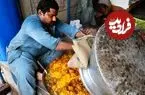 ببینید| غذای خیابانی در پاکستان؛ پخت بریانی مرغ در کراچی