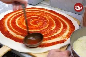 ببینید| غذای خیابانی در آمریکا؛ پخت پیتزا و کالزونه در نیویورک