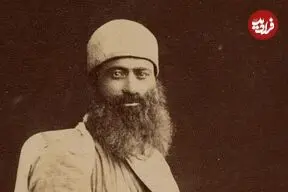 عکس| سفر زمان؛ تصویری از «حمال تهرانی» در آتلیۀ «عکاس روس» در دوران قاجار