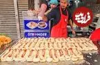 ببینید| غذای خیابانی در پاکستان؛ مهارت آشپز خیابانی در تهیه برگر با تخم مرغ در کراچی