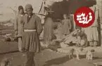 عکس| سفر زمان؛ منظرۀ یک خیابان خاکی و یکی از دروازه‌های تهران در دوران ناصرالدین شاه