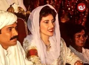 عکس؛ سفر به تاریخ؛ «بی‌نظیر بوتو، نخست وزیر اسبق پاکستان» در حال زیارت ضریح امام رضا (ع)؛ سال 1372