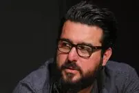 ( عکس) تصویری بامزه از محسن کیایی در آغوش مادرش