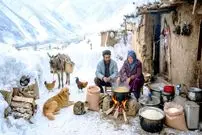 ببینید| غذای روستایی در افغانستان؛ پخت لپه پلو در غار در هوای برفی