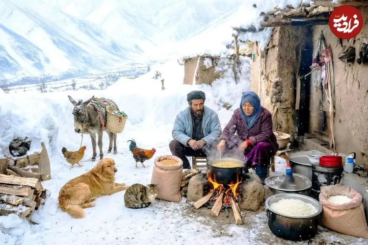 ببینید| غذای روستایی در افغانستان؛ پخت لپه پلو در غار در هوای برفی