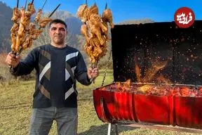 ببینید| غذای روستایی در آذربایجان؛ ساخت یک کباب پز با بشکه و کباب کردن مرغ و بادمجان در آن